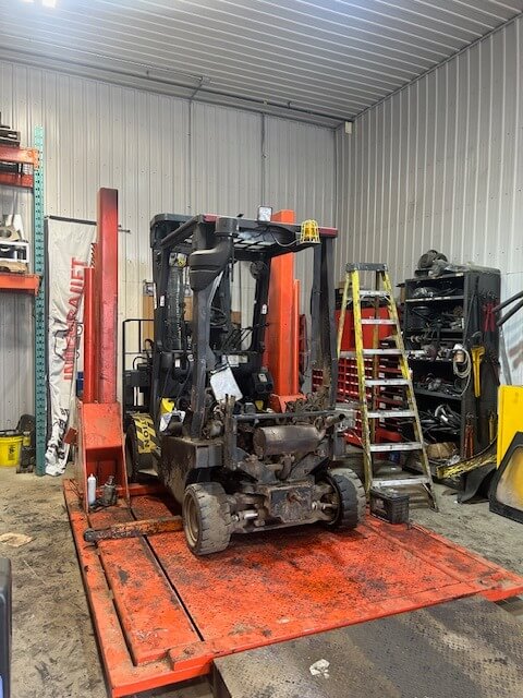 Forklift being repaired